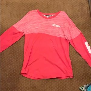 Pink long sleeve shirt.